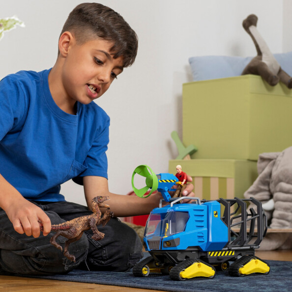 Raupenfahrzeug „Dinosaurs“ mit dem Dakotaraptor und dem Ranger Flynn